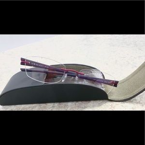Silhouette eyeglasses 4310 Plum/ rimless.